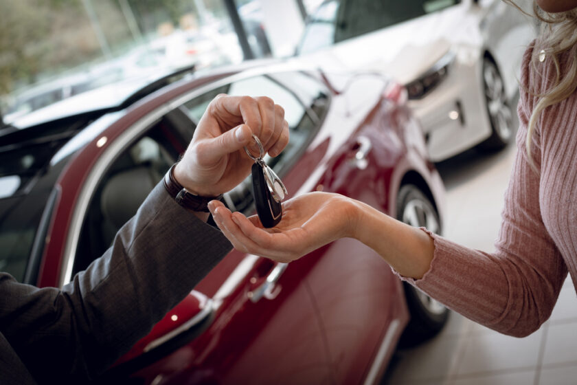 Man handing over car keys