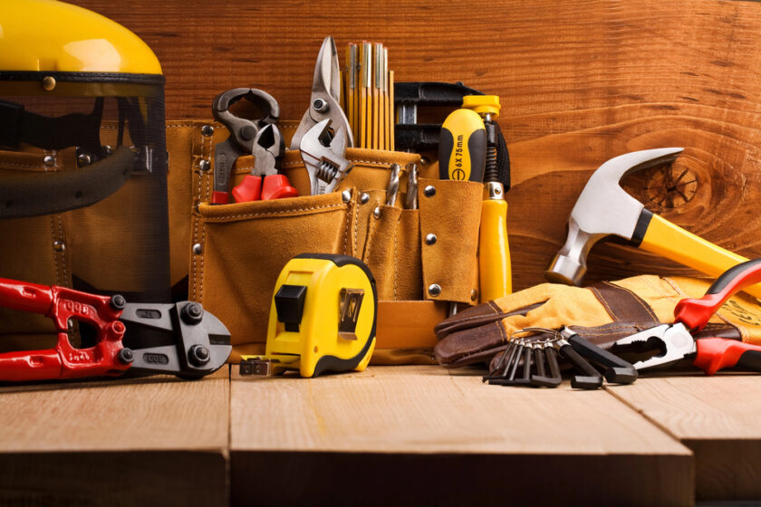 Home workbench laid out with tools