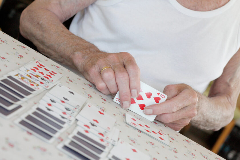 person playing Solitaire