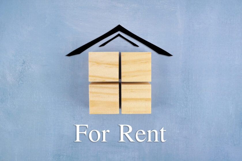 Wood cubes block with icon house and word For Rent.