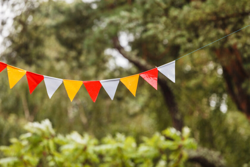 Flag banner hanging in trees