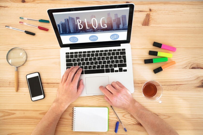 blog, hands writing on keyboard of computer, blogging concept