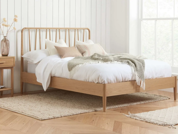 Lovely bed in a bright bedroom