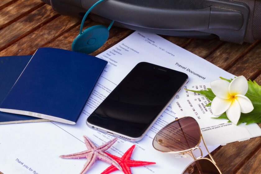 Passport sunglasses and suitcase