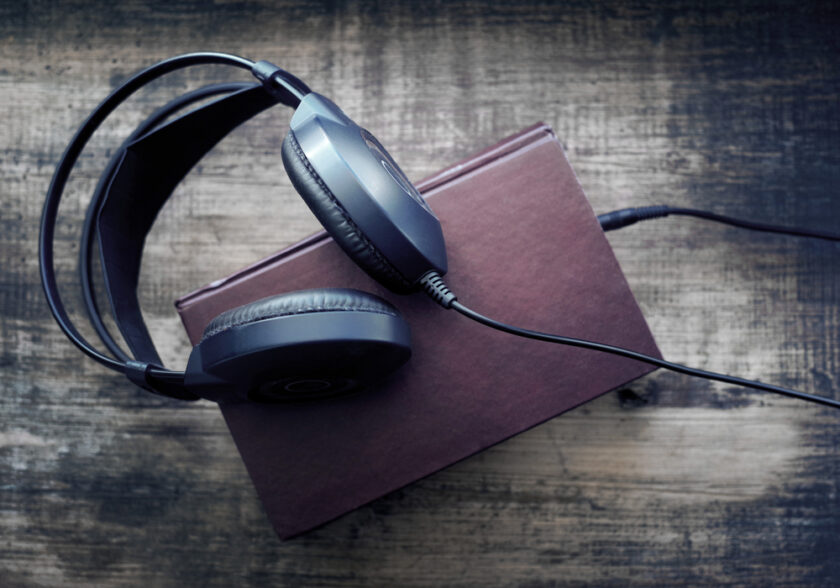 Headphones and a book