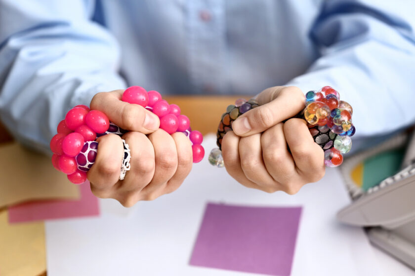 Women squeesing stress balls