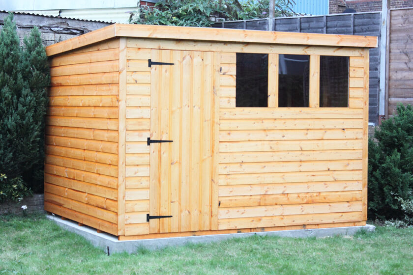 Garden Shed with three windows and a door to the front