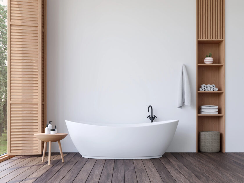 A serene bathroom featuring a modern freestanding bath, perfect for relaxation.