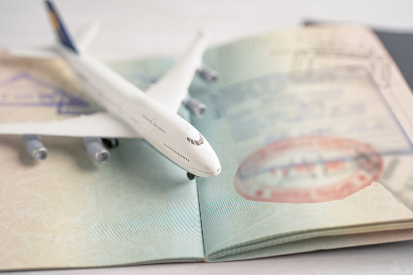 Approved Stamp visa and passport document to immigration at airport in country.