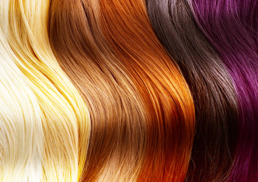Four sections of long, smooth hair in different colors—platinum blonde, light brown, copper red, and deep burgundy—are arranged side by side in vertical waves.