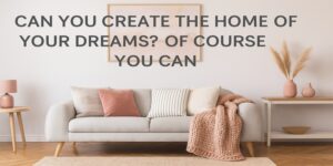 A modern living room with a light gray sofa, pastel and striped cushions, a pink throw blanket, wooden tables with decorative vases, and pampas grass. Text on image: Can you create the home of your dreams? Of course you can.