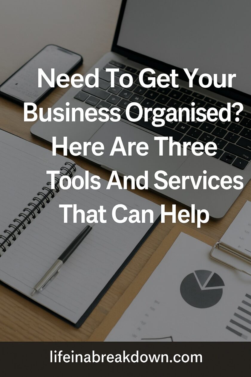 A desk with a laptop, smartphone, notepad, pen, and printed charts, overlaid with text: Need To Get Your Business Organised? Here Are Three Tools And Services That Can Help. lifeinabreakdown.com.