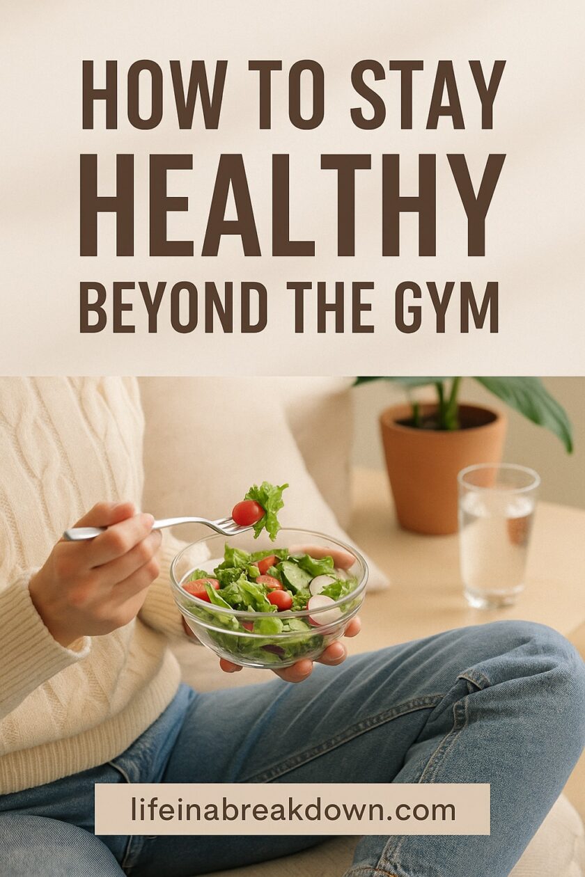 A person sits cross-legged, holding a glass bowl of salad and a fork. Text above reads How to Stay Healthy Beyond the Gym. A glass of water and a potted plant are on the table. Website: lifeinabreakdown.com.