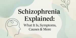 Text reads Schizophrenia Explained: What It Is, Symptoms, Causes & More with abstract pastel background, a simple drawing of a human head and brain, and a small line art plant.