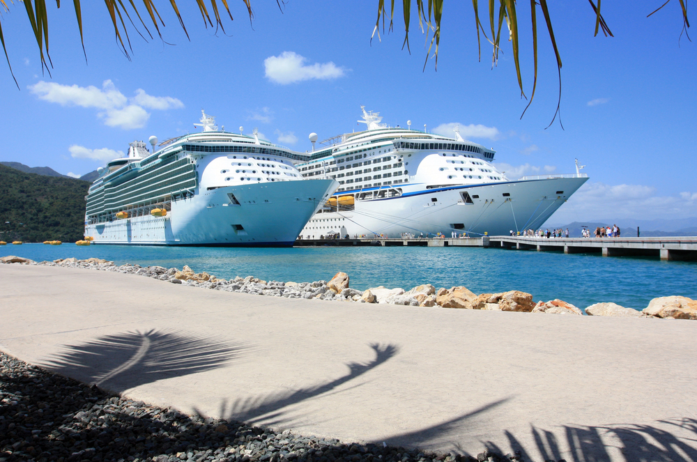 Two large ships docked at a quay.