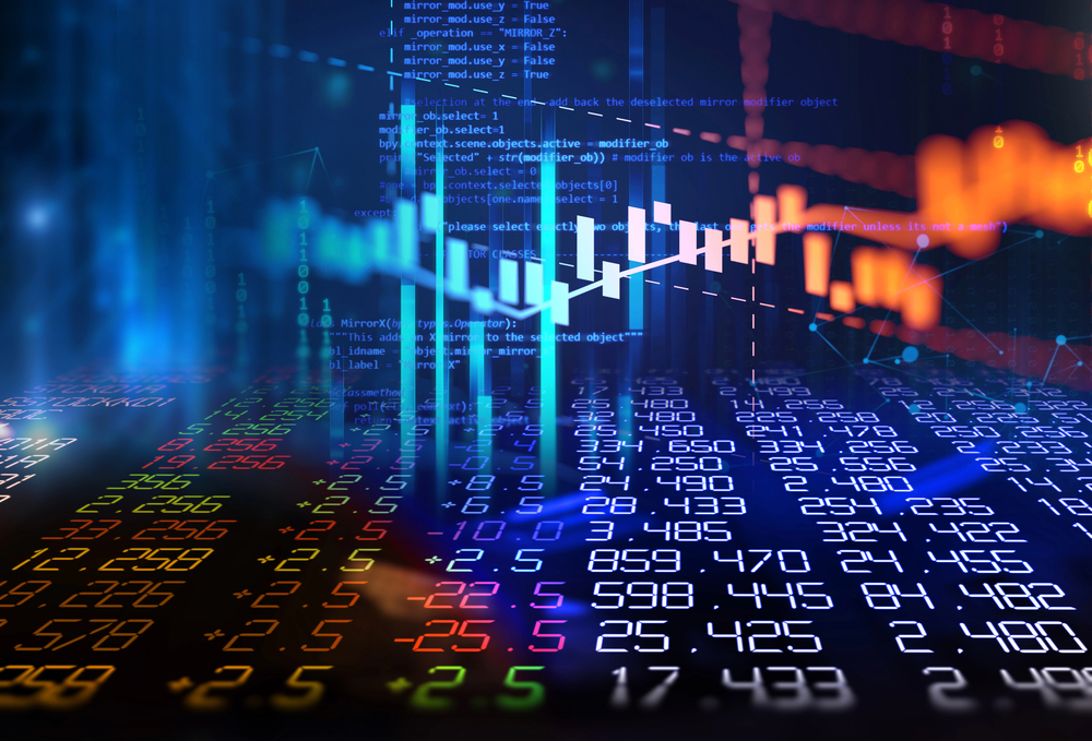A digital image shows colourful stock market data, with numbers, candlestick charts, and graphs representing financial trading activity against a dark, blurred background.
