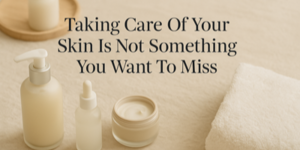 Skincare products, including a pump bottle, dropper bottle, and a cream jar, are arranged beside a folded white towel and a tray. The text reads, Taking Care Of Your Skin Is Not Something You Want To Miss.