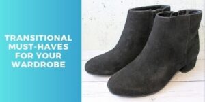 A pair of black suede ankle boots sits on a white wooden surface next to text that reads, Transitional must-haves for your wardrobe on a blue background.