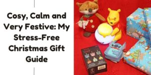 A festive scene with Christmas gifts, soft toys including a fox and Winnie the Pooh holding a light, Stitch figurine, wrapped presents, and the text: Cosy, Calm and Very Festive: My Stress-Free Christmas Gift Guide.