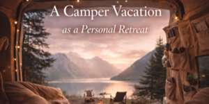 View from inside a cosy camper van decorated with fairy lights, looking out onto a peaceful lake surrounded by mountains and pine trees at sunset. Text reads: A Camper Holiday as a Personal Retreat.