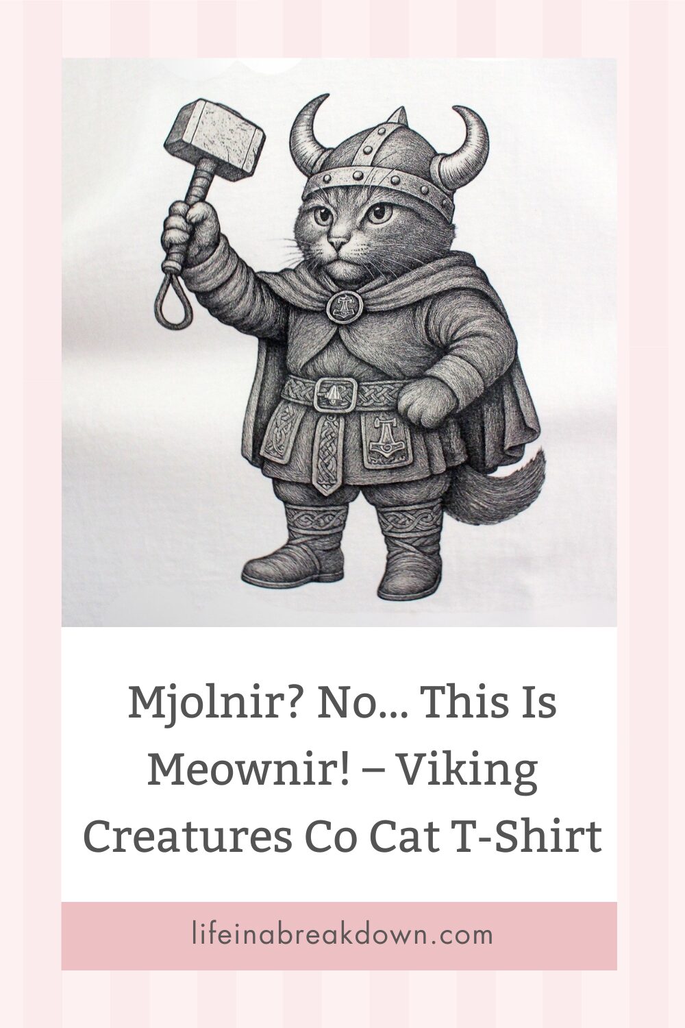 A cat dressed as a Viking holds a hammer and wears a horned helmet, armour, and a cape. Below, text reads: Mjolnir? No... This Is Meownir! – Viking Creatures Co Cat T-Shirt with the website lifeinabreakdown.com.