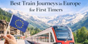 A modern red and white train at a scenic mountain station, with a hand holding an EU flag in the foreground. Text reads: Best Train Journeys in Europe for First Timers.