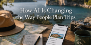 A table by a lake with a hat, notebook labelled Trip Plan, pen, smartphone showing a travel app, camera, and coffee mug. Text reads: How AI Is Changing the Way People Plan Trips.