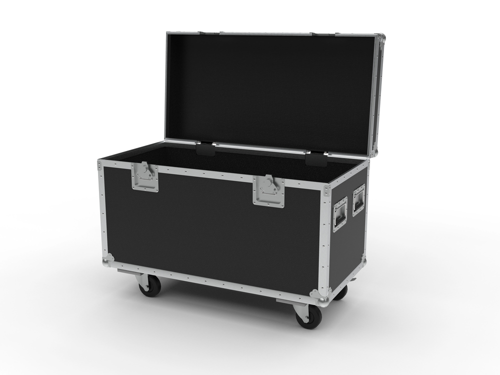 A large black flight case with metal edges and corners, open lid, and four castors. The case has metal handles on the sides and is empty inside, set against a white background.