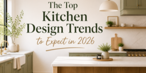 Modern kitchen with green cupboards, white worktops, open shelving, and plants, featuring text: The Top Kitchen Design Trends to Expect in 2026.