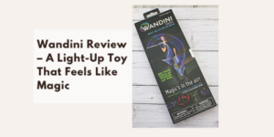 A box of the Wandini light-up toy is shown next to text that reads, Wandini Review – A Light-Up Toy That Feels Like Magic, on a light wooden background.