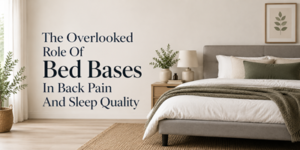 A modern, neutral-toned bedroom with a bed, plants, and minimalist decor. Text reads: The Overlooked Role Of Bed Bases In Back Pain And Sleep Quality.