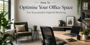Modern office space with large windows, plants, a desk with a laptop, chair, and lamp. Wall text reads: How To Optimise Your Office Space For Successful Hybrid Working.