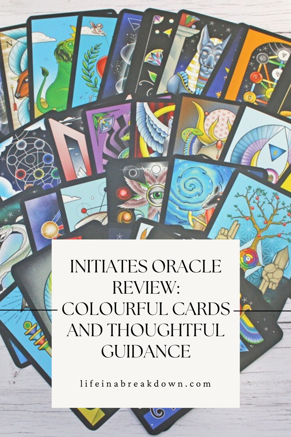 A spread of colourful oracle cards featuring various symbolic and abstract designs, with a white overlay text that reads, Initiates Oracle Review: Colourful Cards and Thoughtful Guidance - lifeinabreakdown.com.