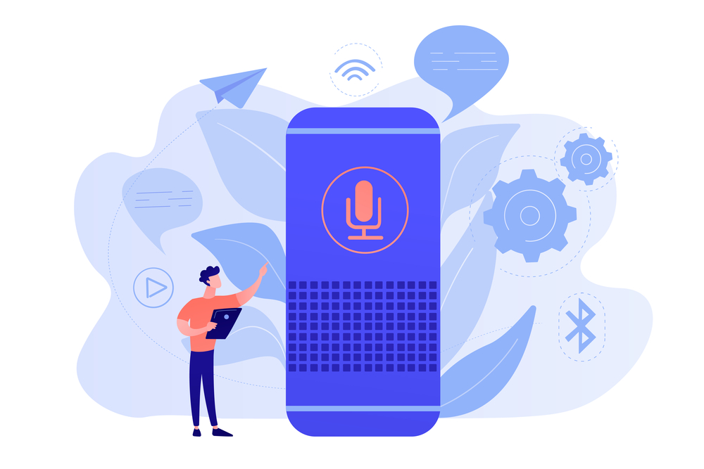 Illustration of a person with a tablet standing next to a giant smart speaker with a microphone icon, surrounded by tech symbols like Bluetooth, Wi-Fi, and gears, representing voice assistant technology.