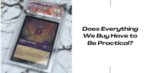 A graded Winnie the Pooh trading card in a clear case next to text that reads, Does Everything We Buy Have to Be Practical? on a white marble background.